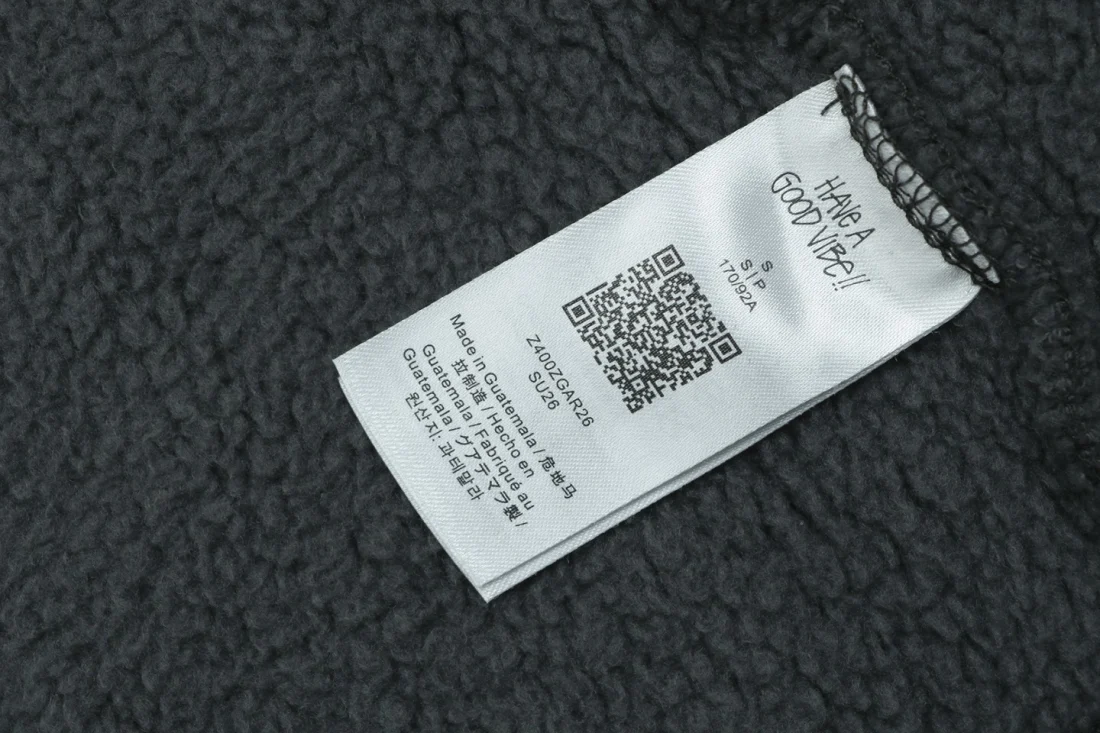 Stussy Surfman Logo Graphic Zip-Up Hoodie Wash label