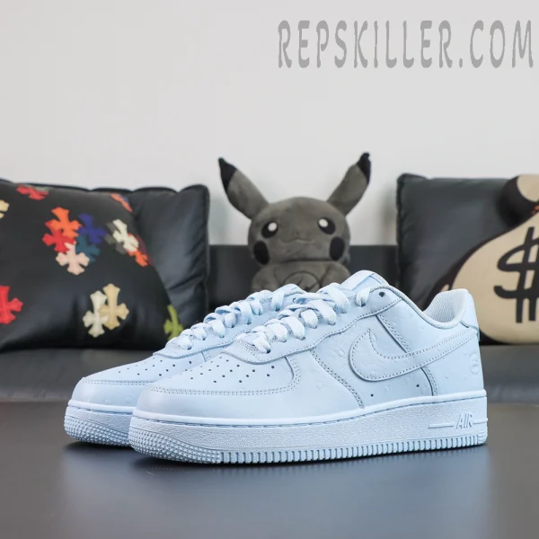 Travis Scott x Nike Air Force 1 Low ’07 Ice Blue rear view featuring embroidered Nike Air heel branding, tonal leather panels, and embossed surface details.